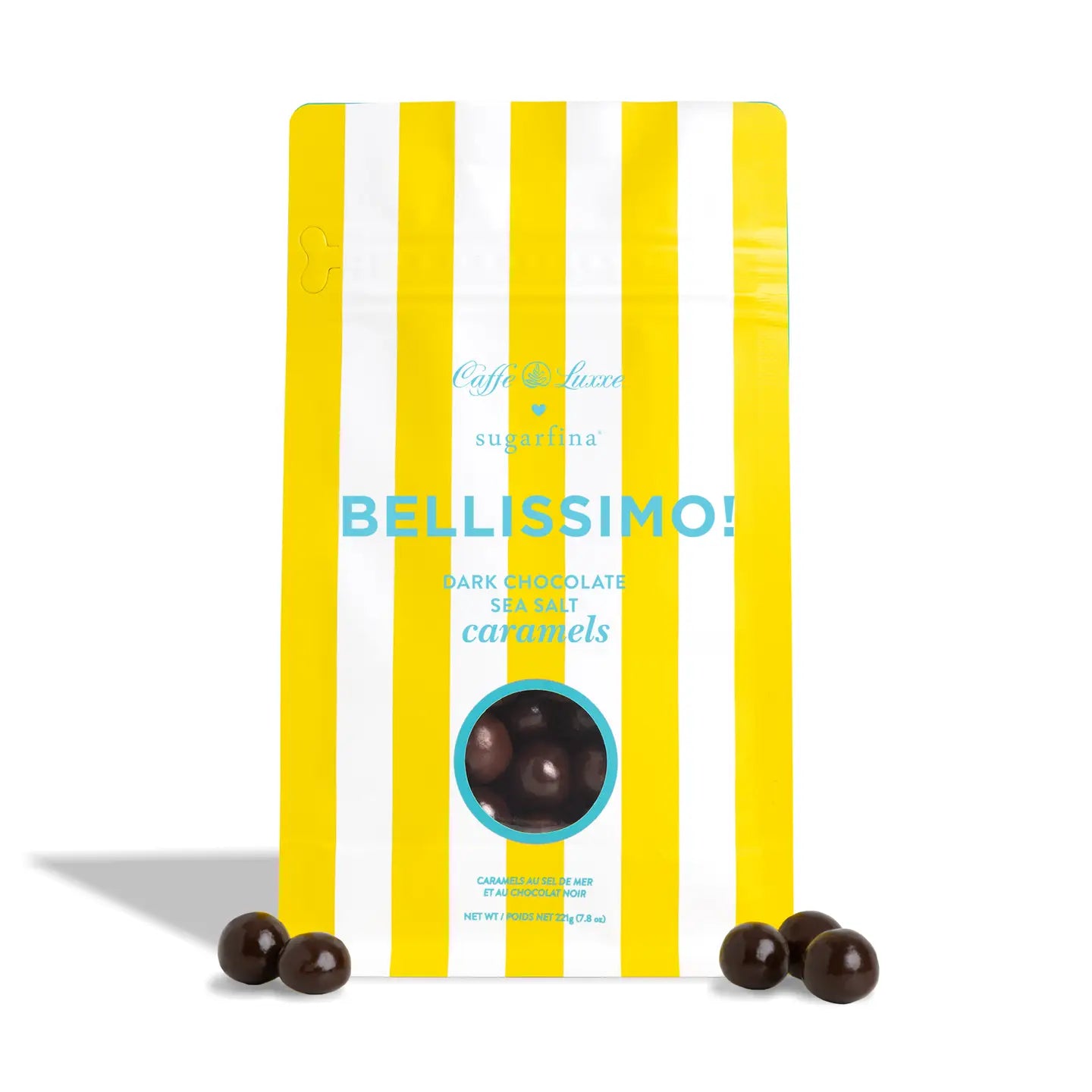 A bag of Caffè Dolce sugarina Bellissimo Dark Chocolate Sea Salt Caramels, featuring a yellow and white striped design with a circular window showing the dark chocolate caramels inside. Three caramels are placed in front of the bag on a white background.
