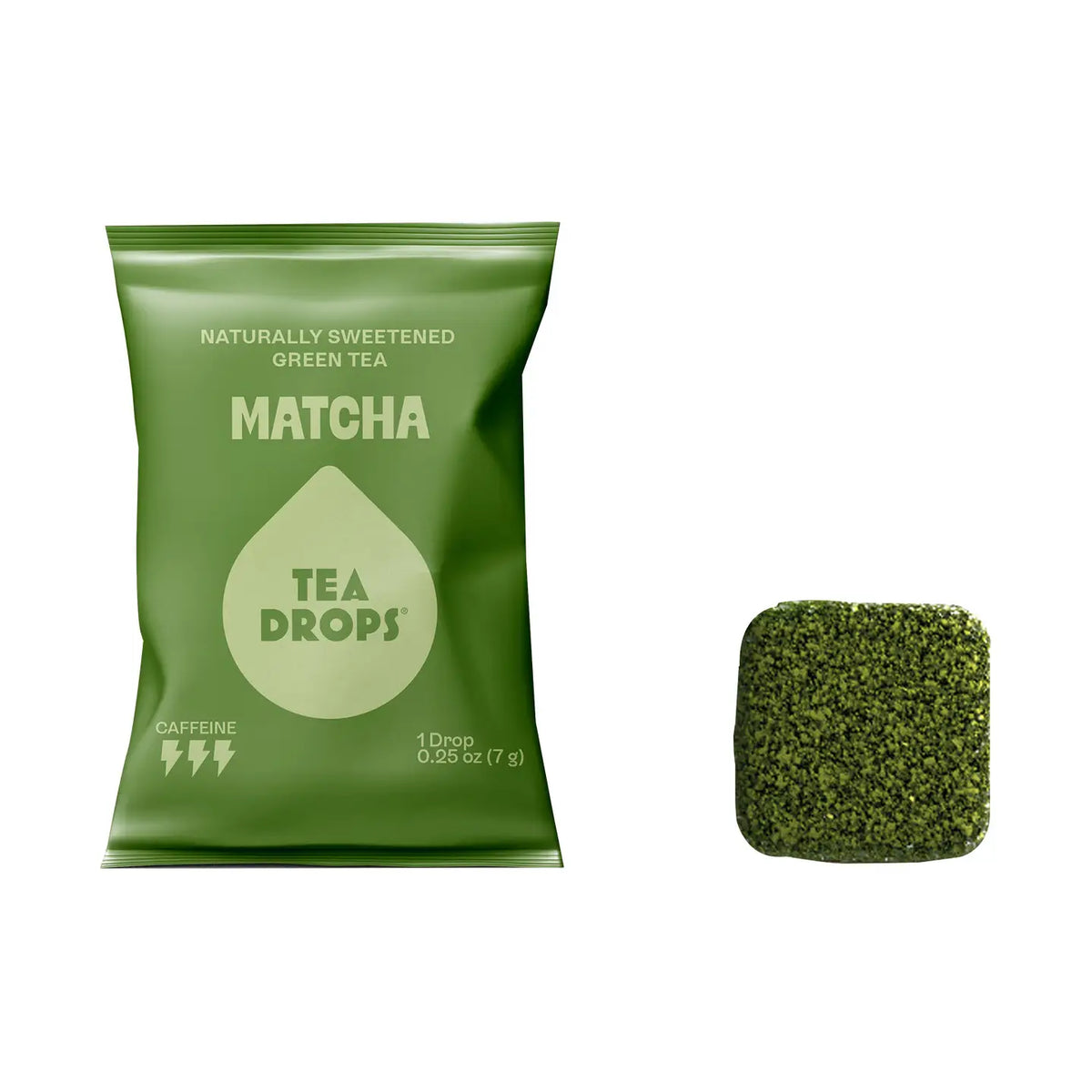 A green bag of Tea Drops Matcha tea drops next to a single square-shaped green tea drop on a plain white background.