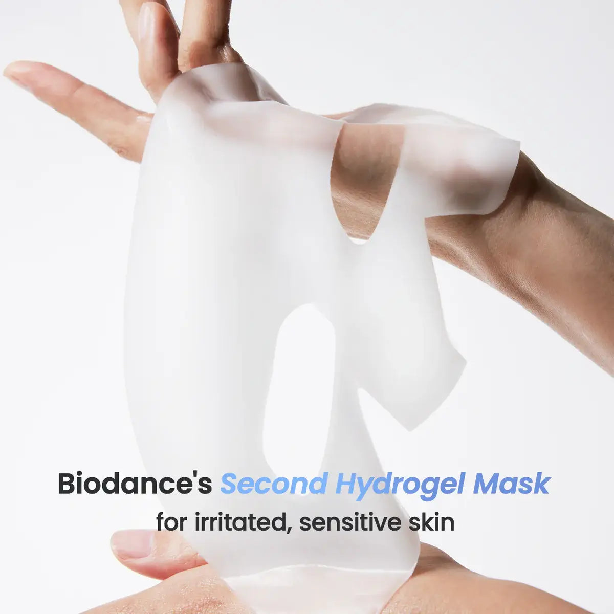 Biodance's Second Hydrogel Mask being held between two hands with a white background.