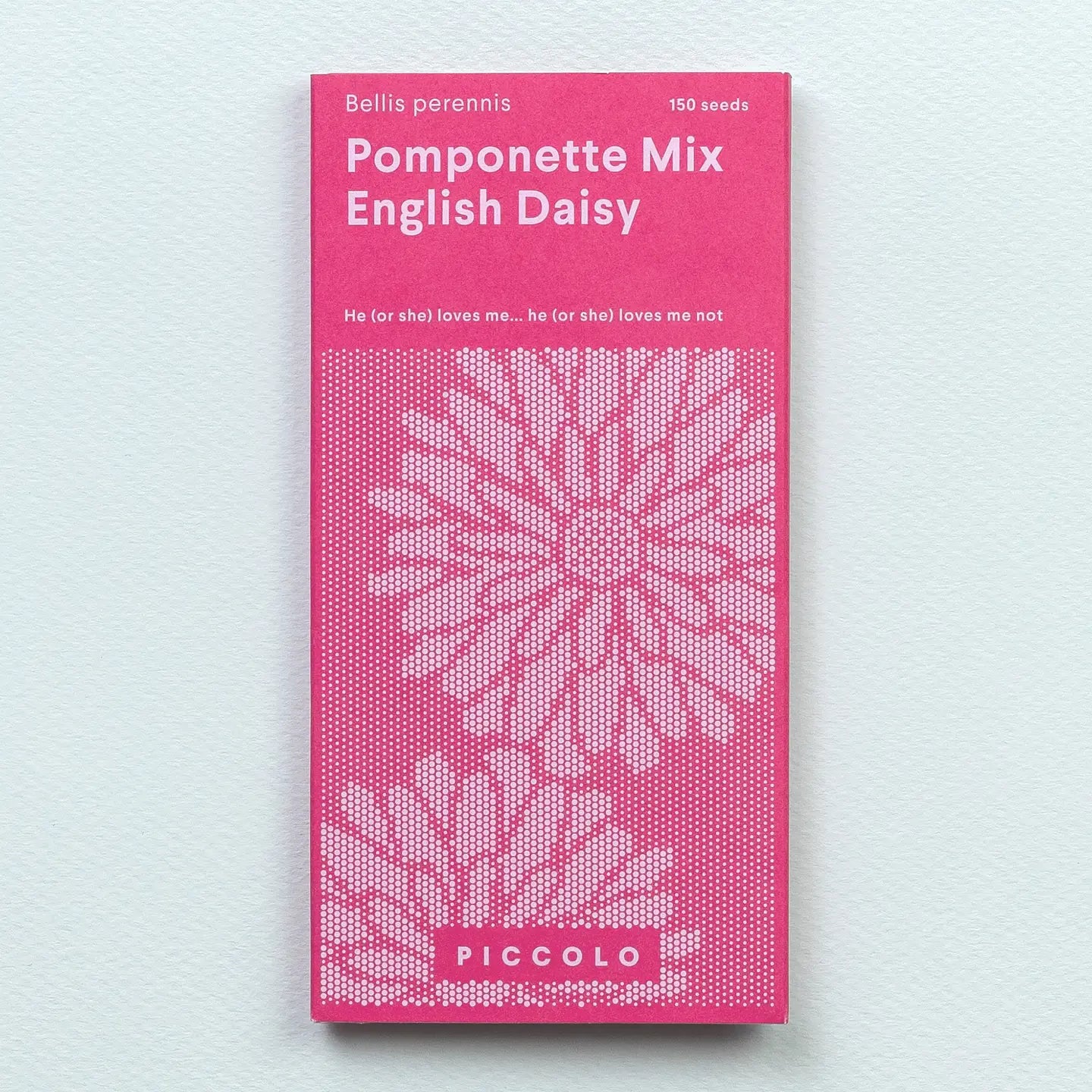Pink seed packet labeled 'Pomponette Mix English Daisy' on a light gray background