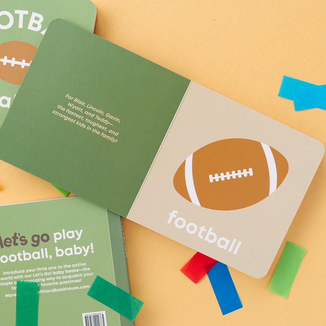 open football baby book surrounded by confetti