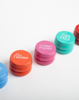 Set of colorful containers with text labels on a white background