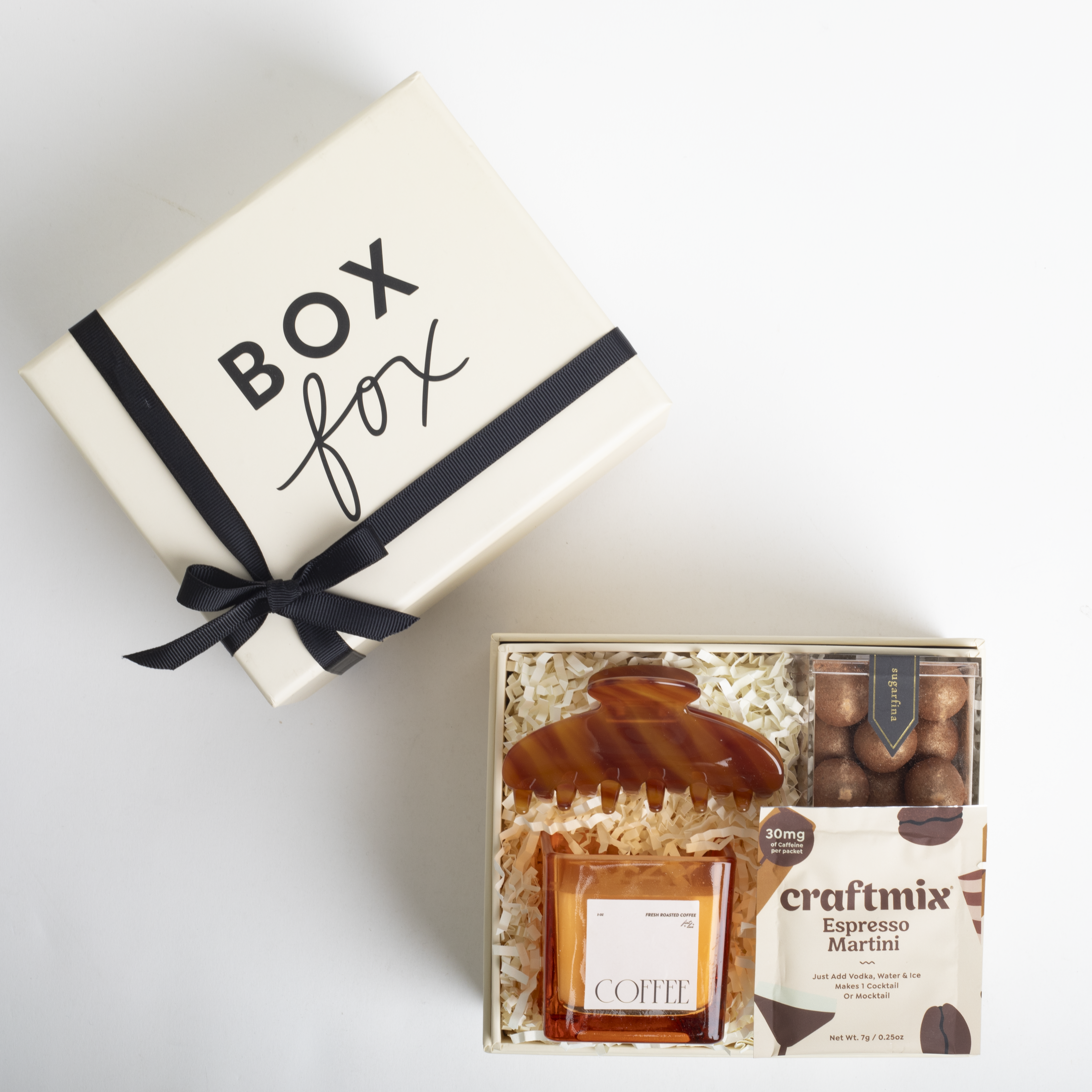 Gift box with 'Box Fox' branding and a coffee set on a white background