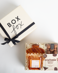 Gift box with 'Box Fox' branding and a coffee set on a white background