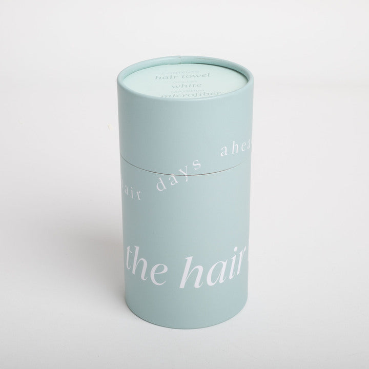 Light blue cylindrical container with text on a white background