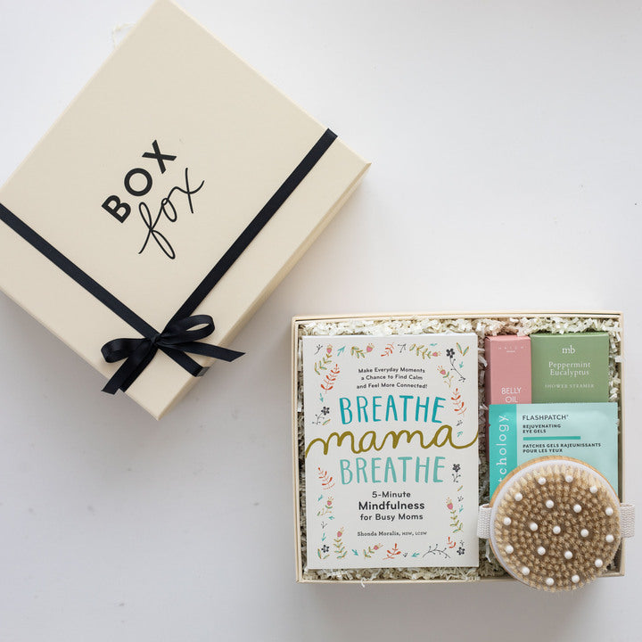 Box Fox gift set with 'Breathe, Mama, Breathe' book and self-care items on a white background