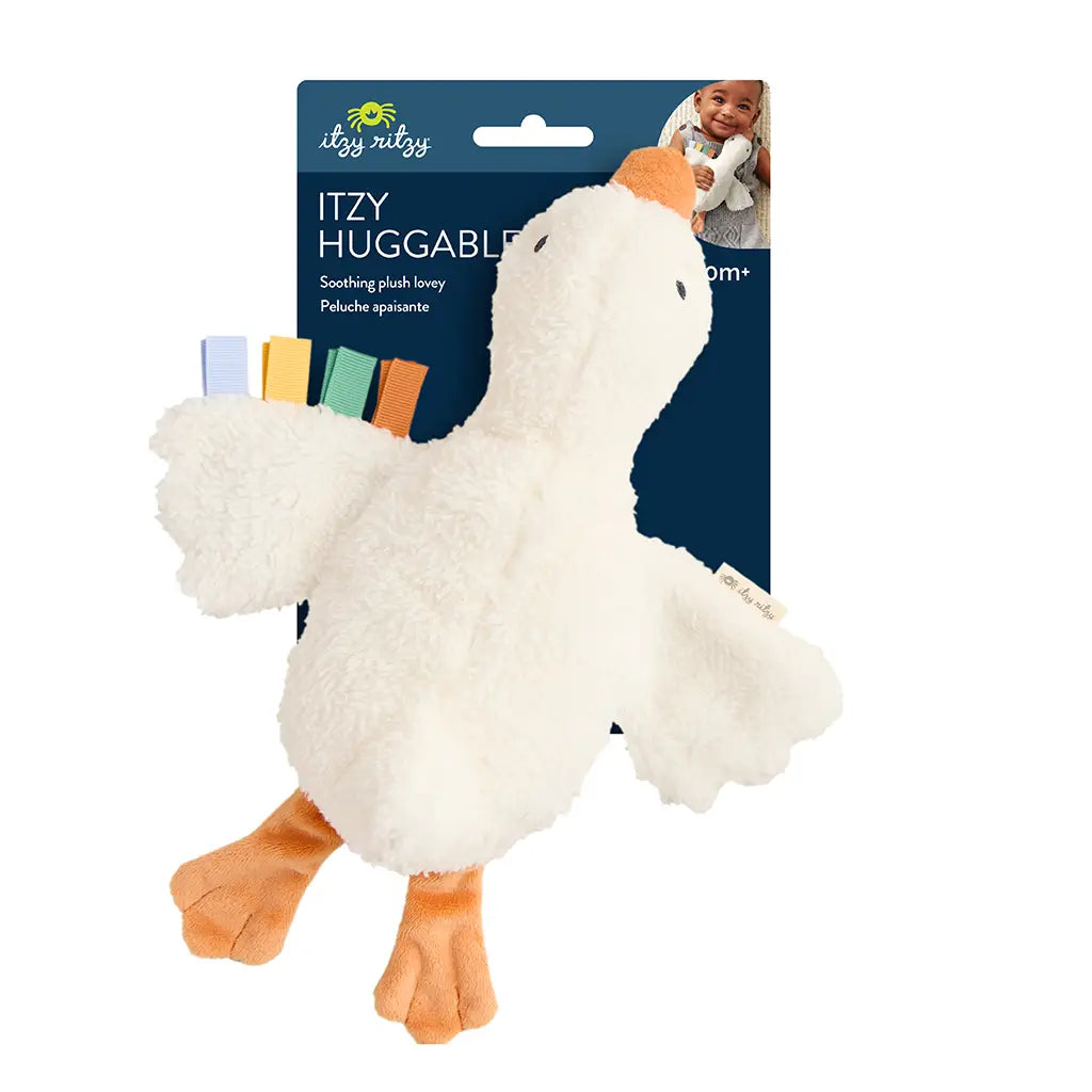 White plush duck toy with colorful feet on a white background