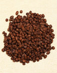 roasted coffee beans on yellow cloth