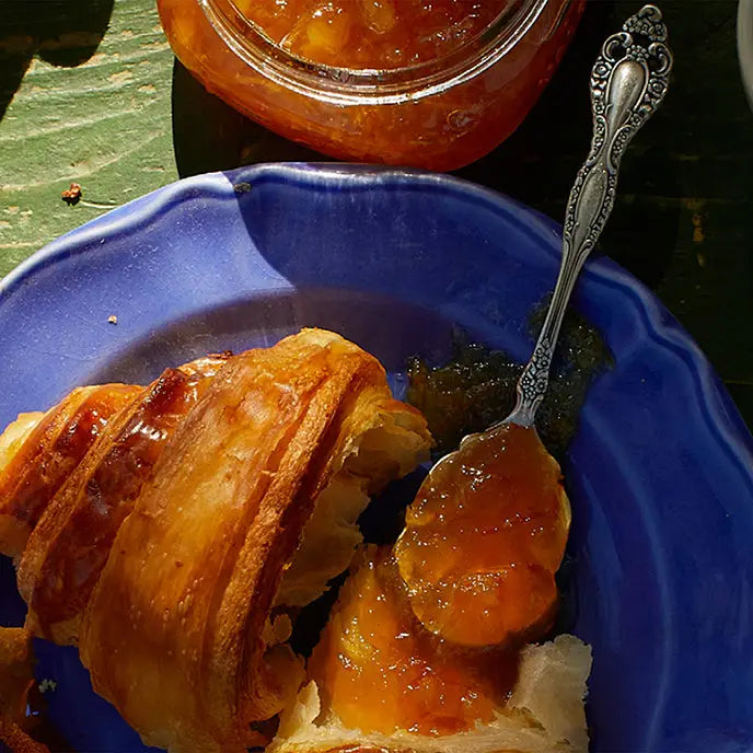cara cara hibiscus marmalade on a croissant