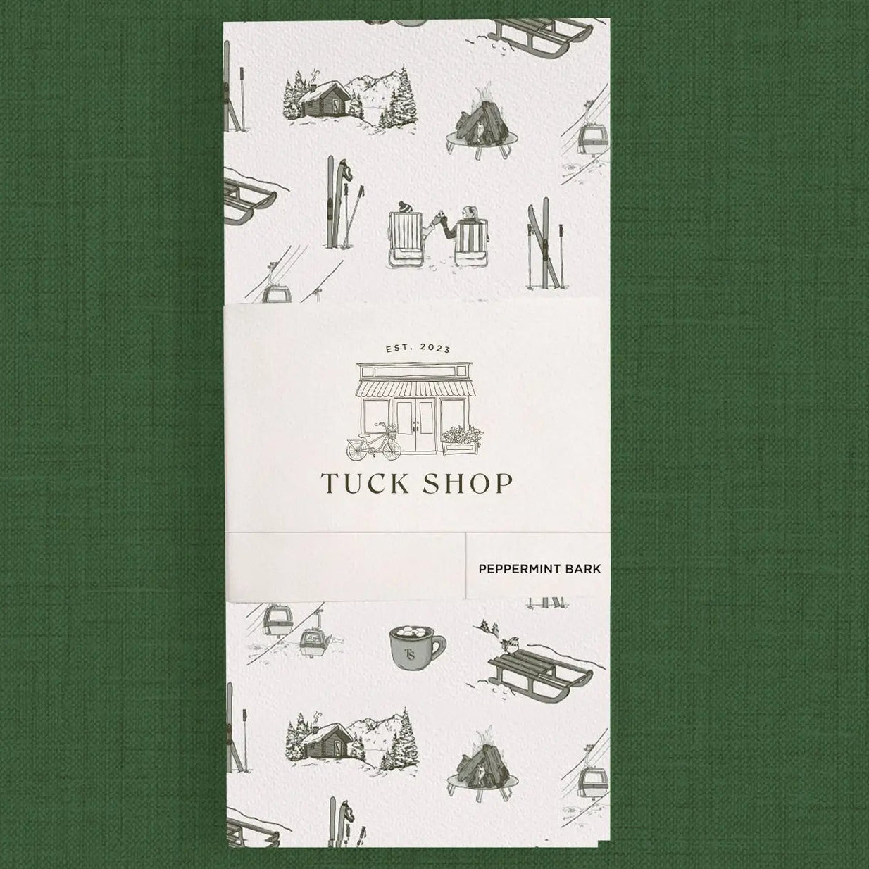 Tuck Shop packaging with illustrations on a green background