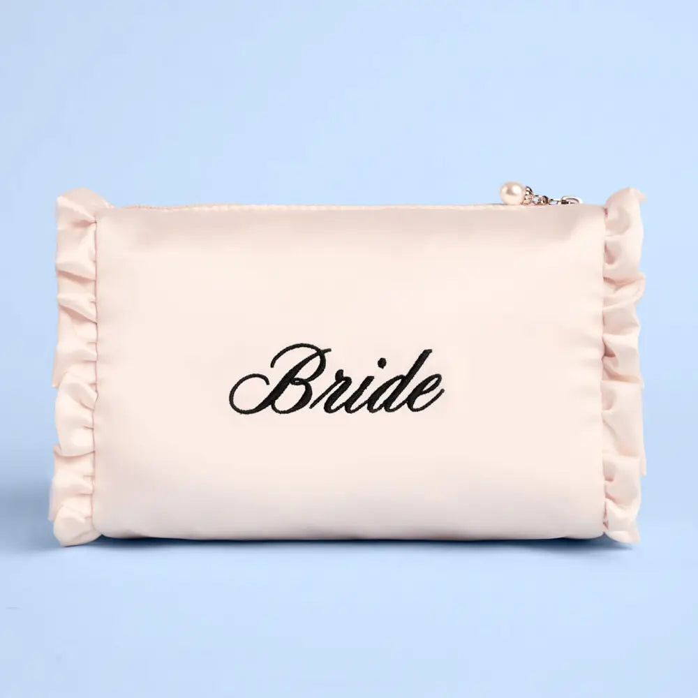 Beige pouch with 'Bride' text on a light blue background