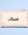 Beige pouch with 'Bride' text on a light blue background