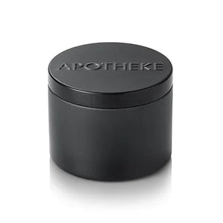 A small matte black cylindrical container with a matching lid, featuring the brand name 'APOTHEKE' embossed on top, set against a solid white background.