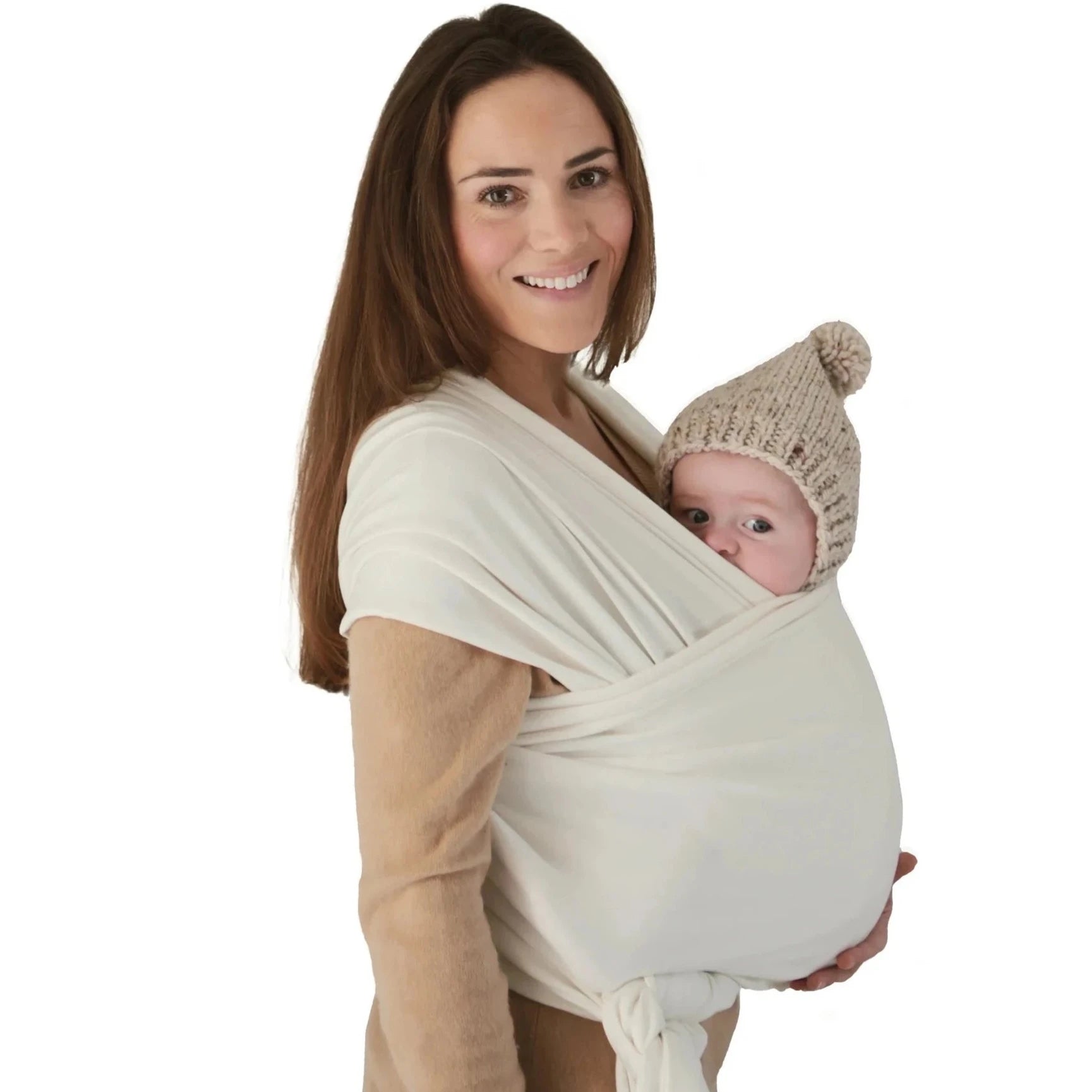 woman holding baby in white baby wrap around her chest