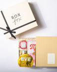 Gift box with 'Box Fox' branding, containing skincare products on a white background