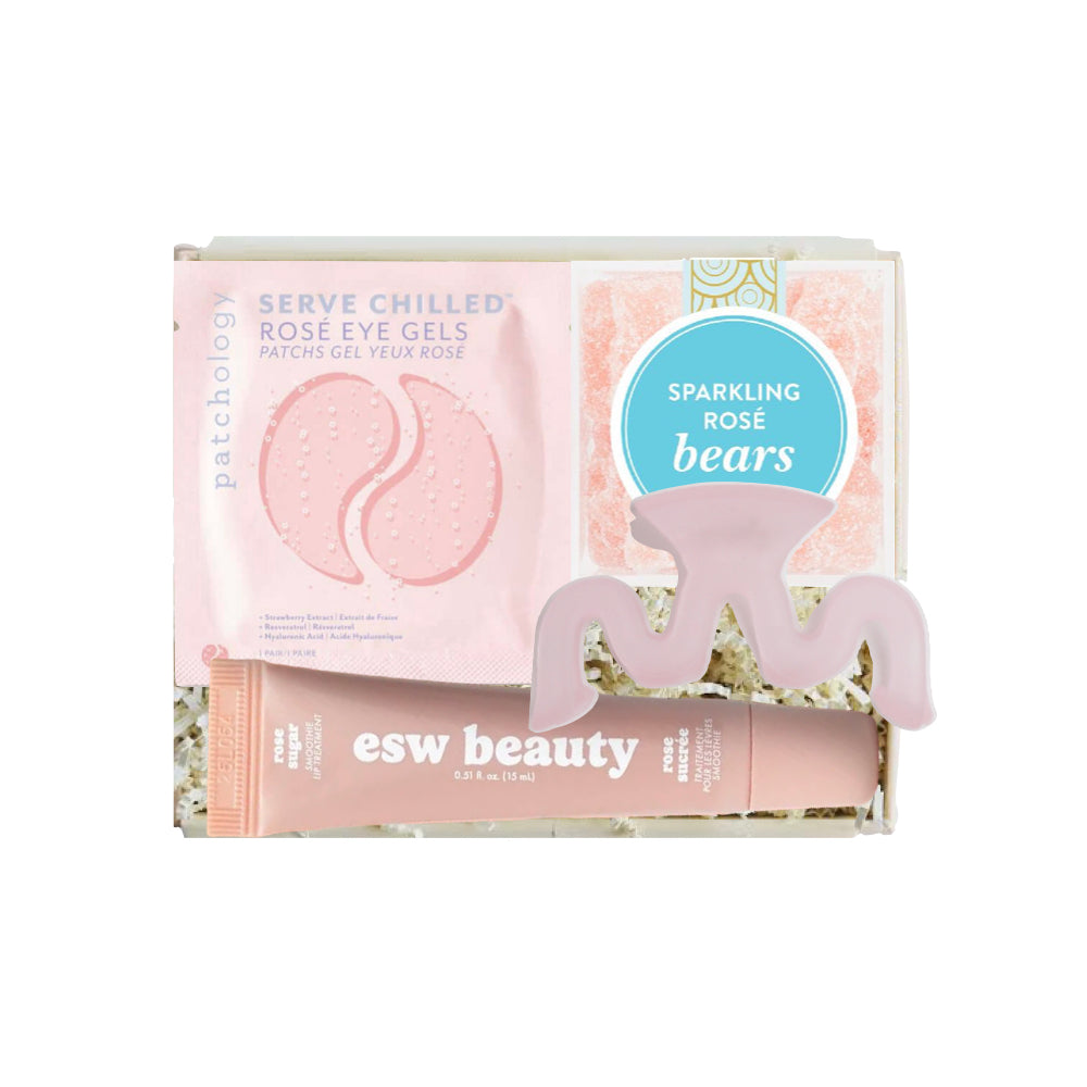 Packaging of sparkling rose eye gels and bears by esw beauty on a white background
