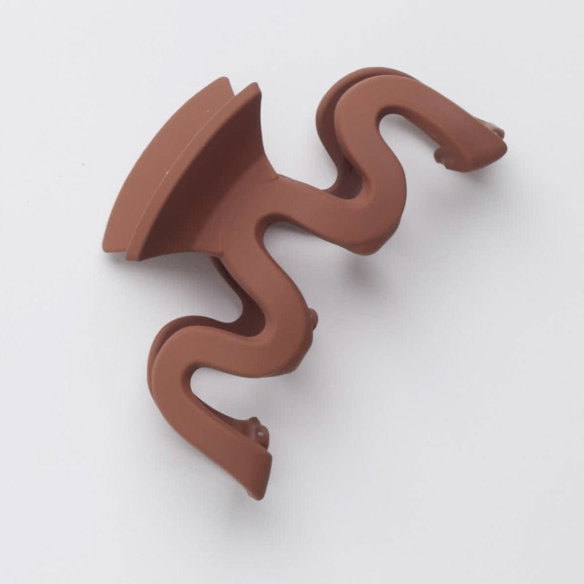 brown squiggle hair clip
