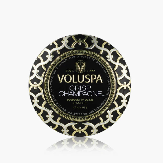 Voluspa Crisp Champagne candle packaging on a white background