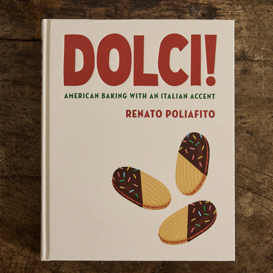Book titled 'DOLCI!' with illustrations of cookies on a wooden surface