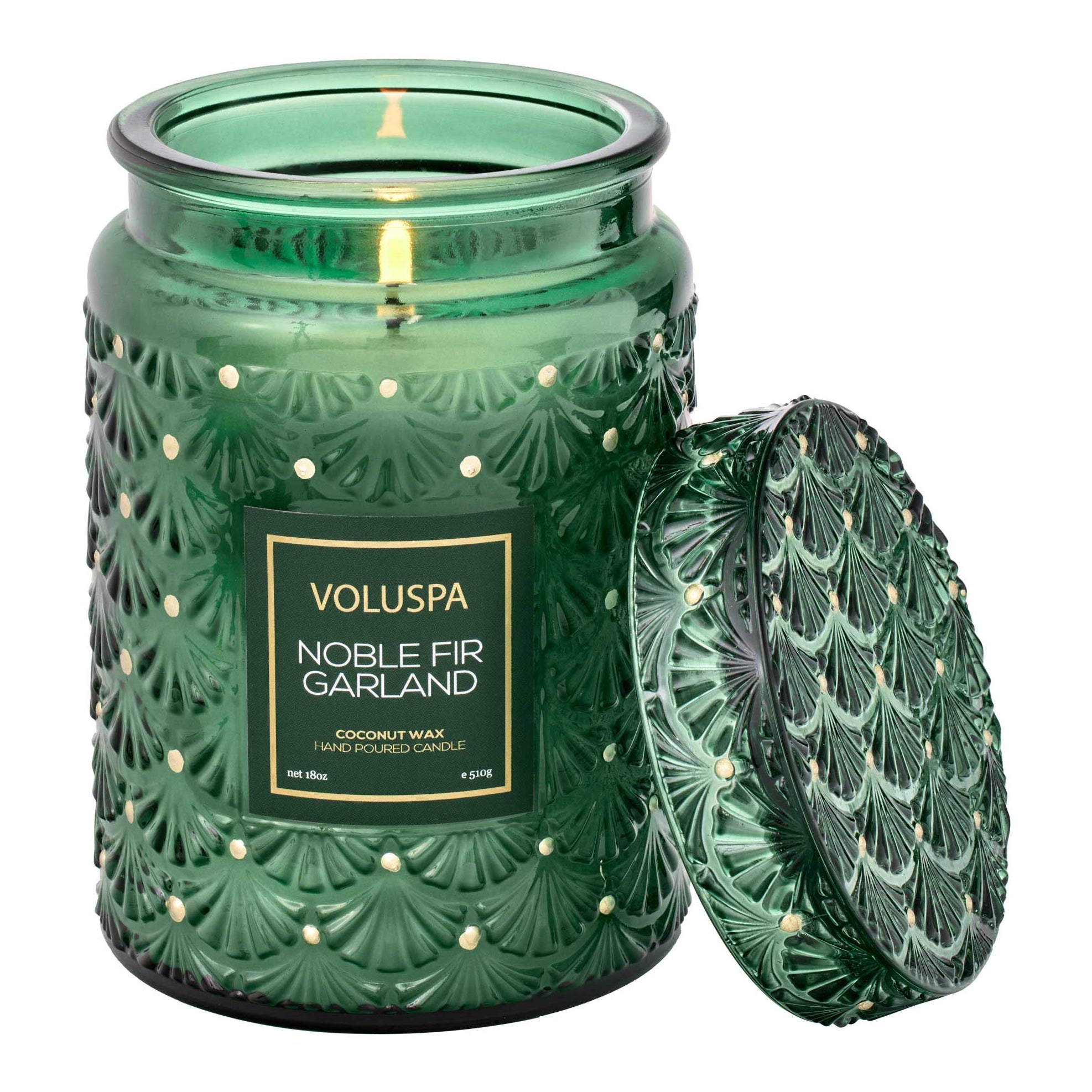 Green glass candle with lid to the side