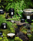 Moso Bamboo Candle collection in nature scene