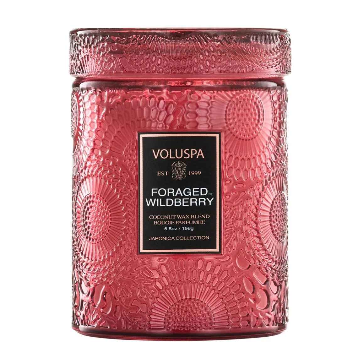 Red candle with a floral design that reads, "VOLUSPA FORAGED WILDBERRY"