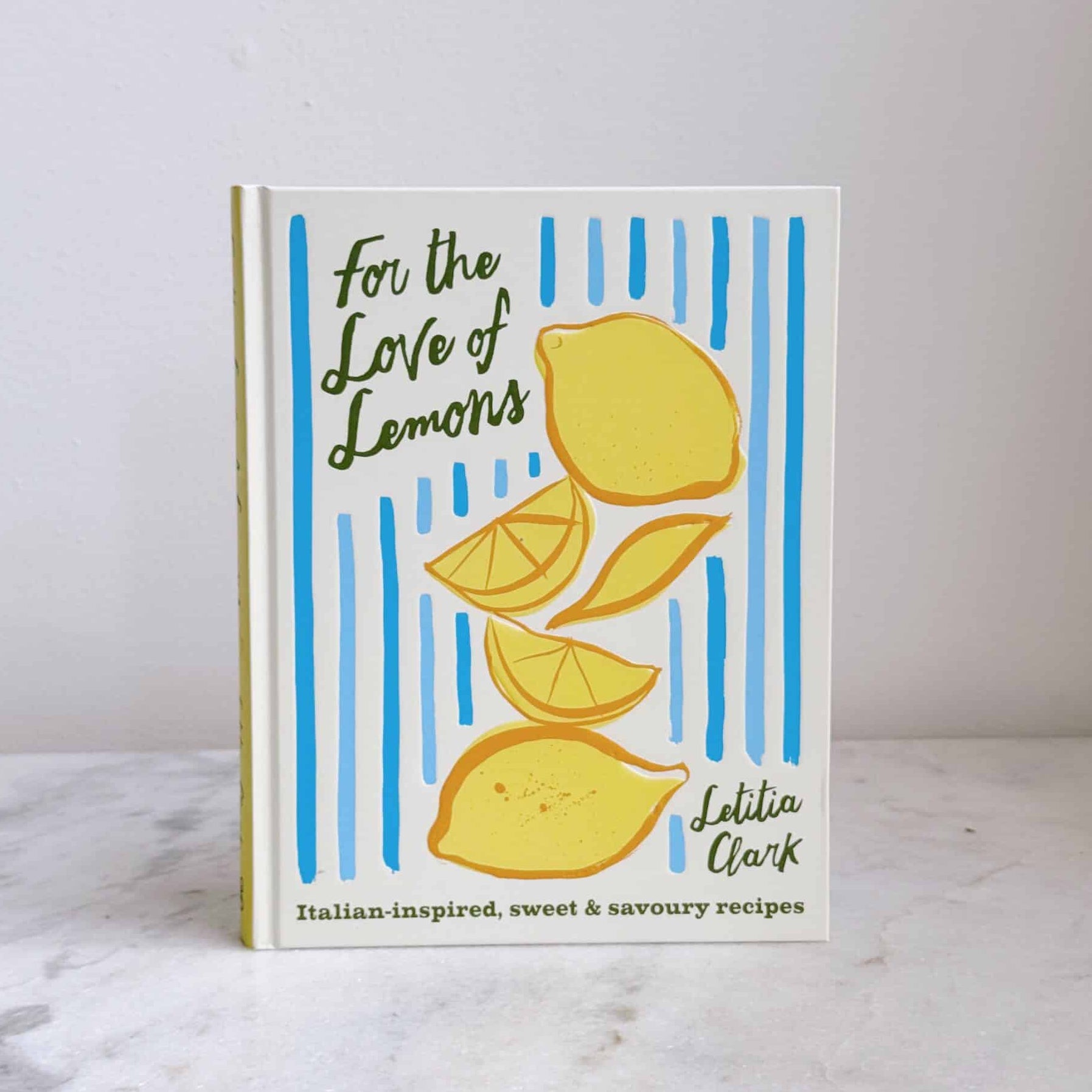 Book titled 'For the Love of Lemons' with lemon illustrations on a white background