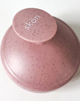 back of scalp massager with think SKON logo printed on handle