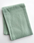 light green waffle weave dish towel