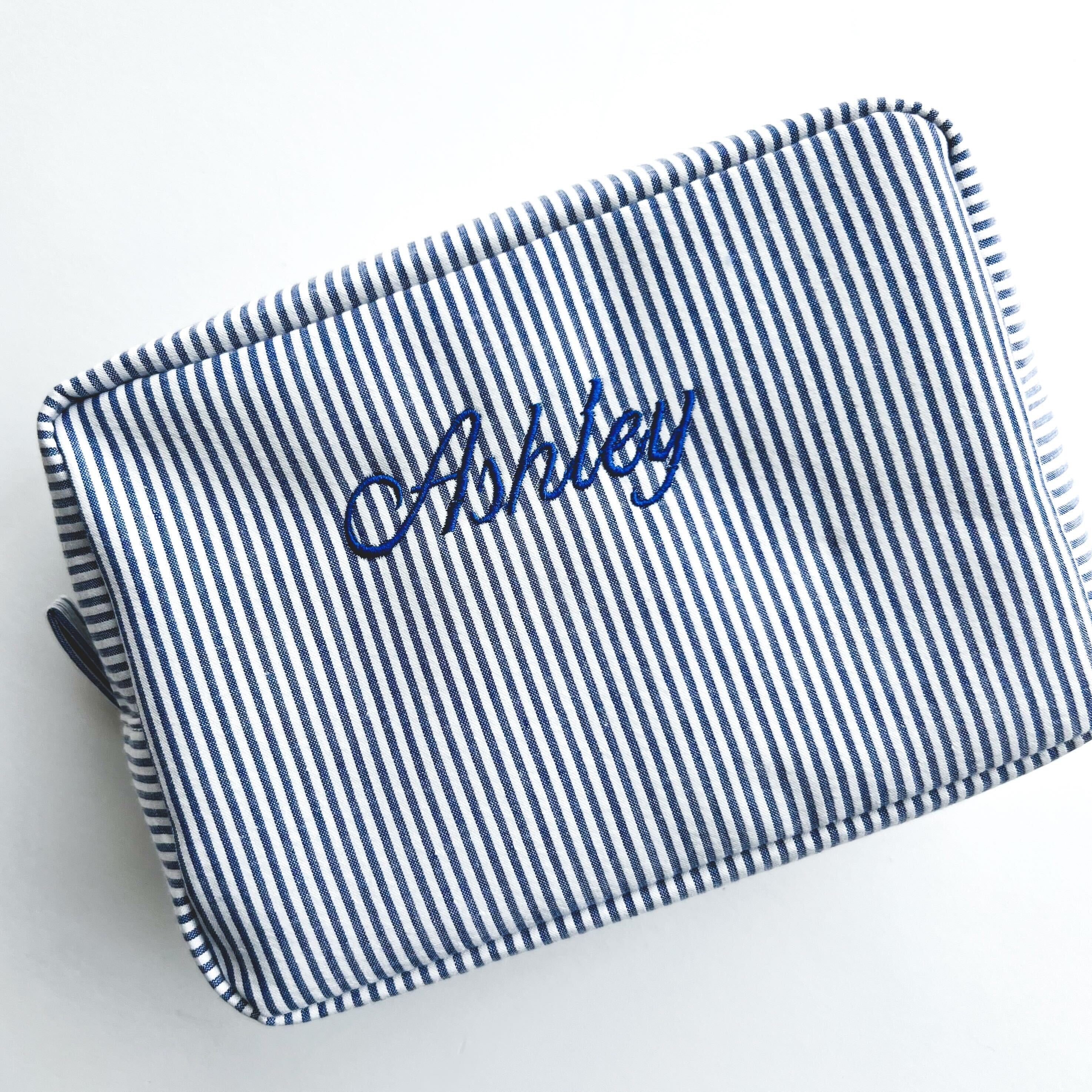 navy striped bag with blue embroidered Ashley on it