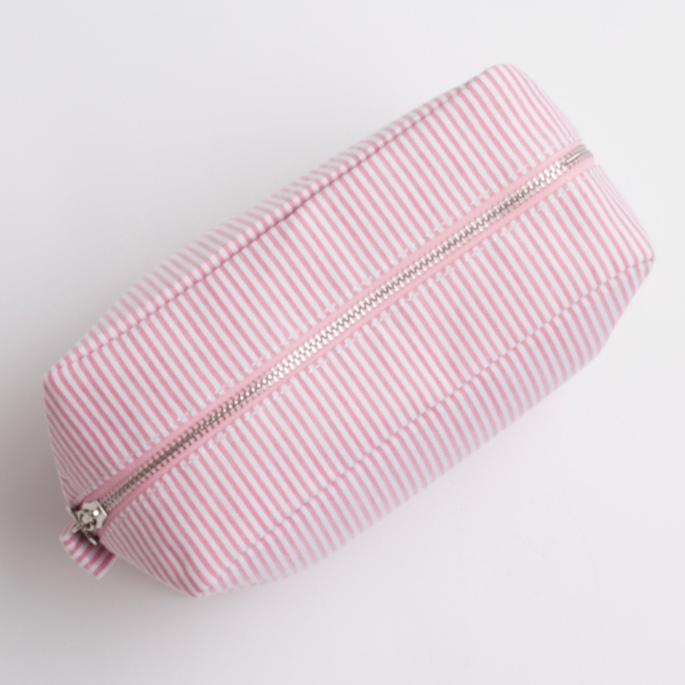 Top view of pink striped bag