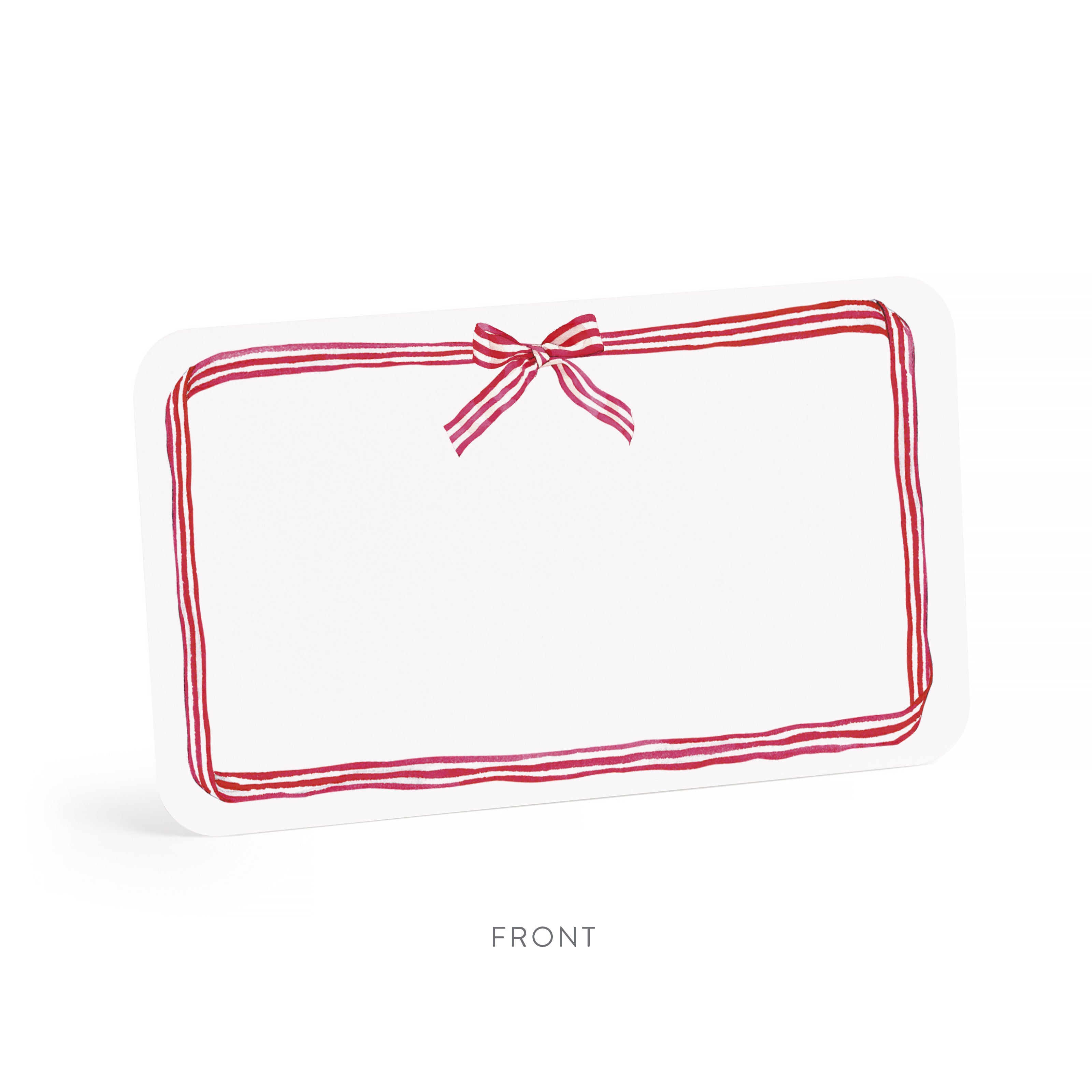 Rectangular white pillow with red stripes and a bow on a white background