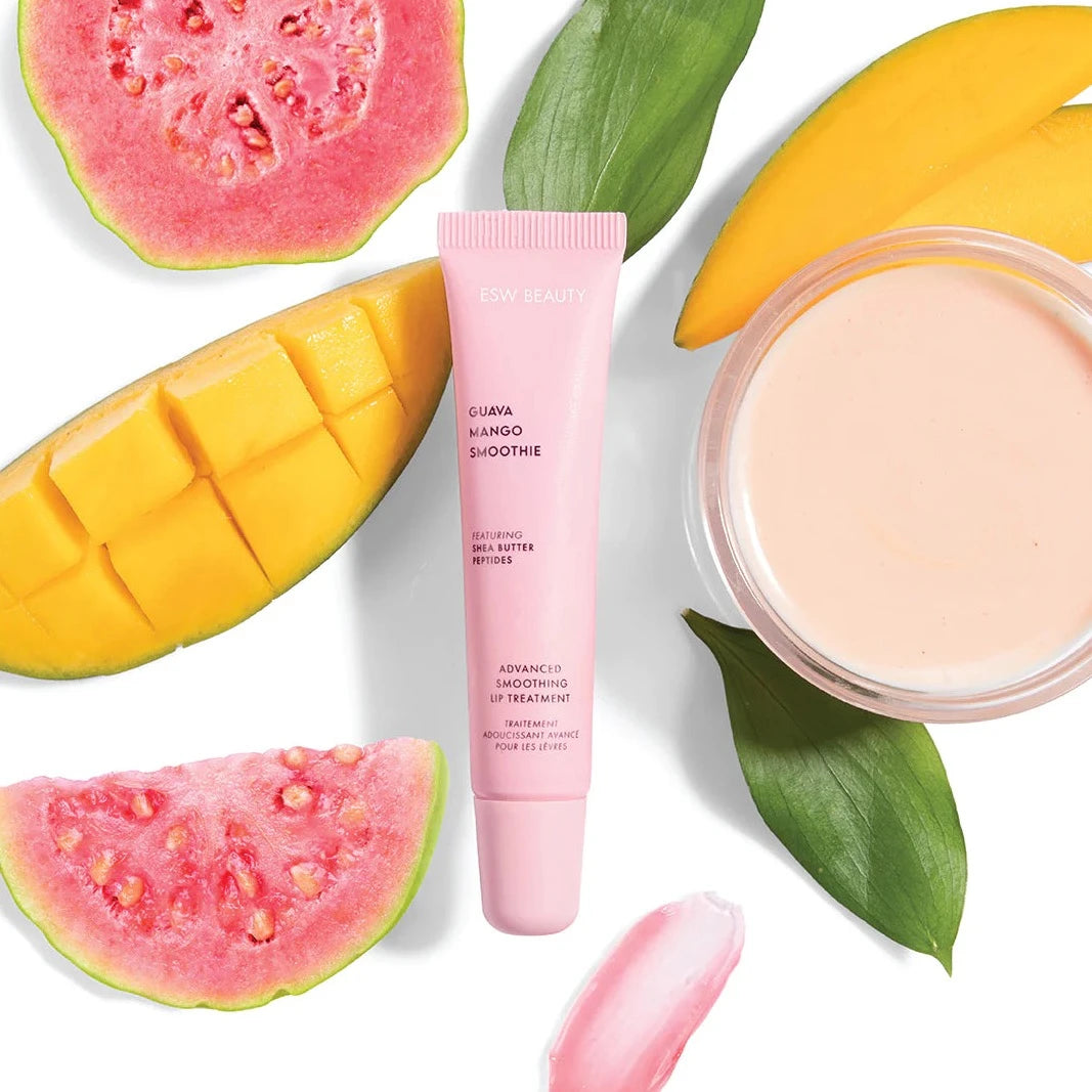 pink lip balm tube with guava and mango surrounding it 
