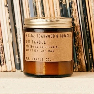 Mini Teakwood & Tobacco 3.5 oz Soy Candle in front of records