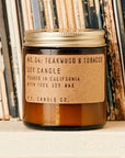 Mini Teakwood & Tobacco 3.5 oz Soy Candle in front of records