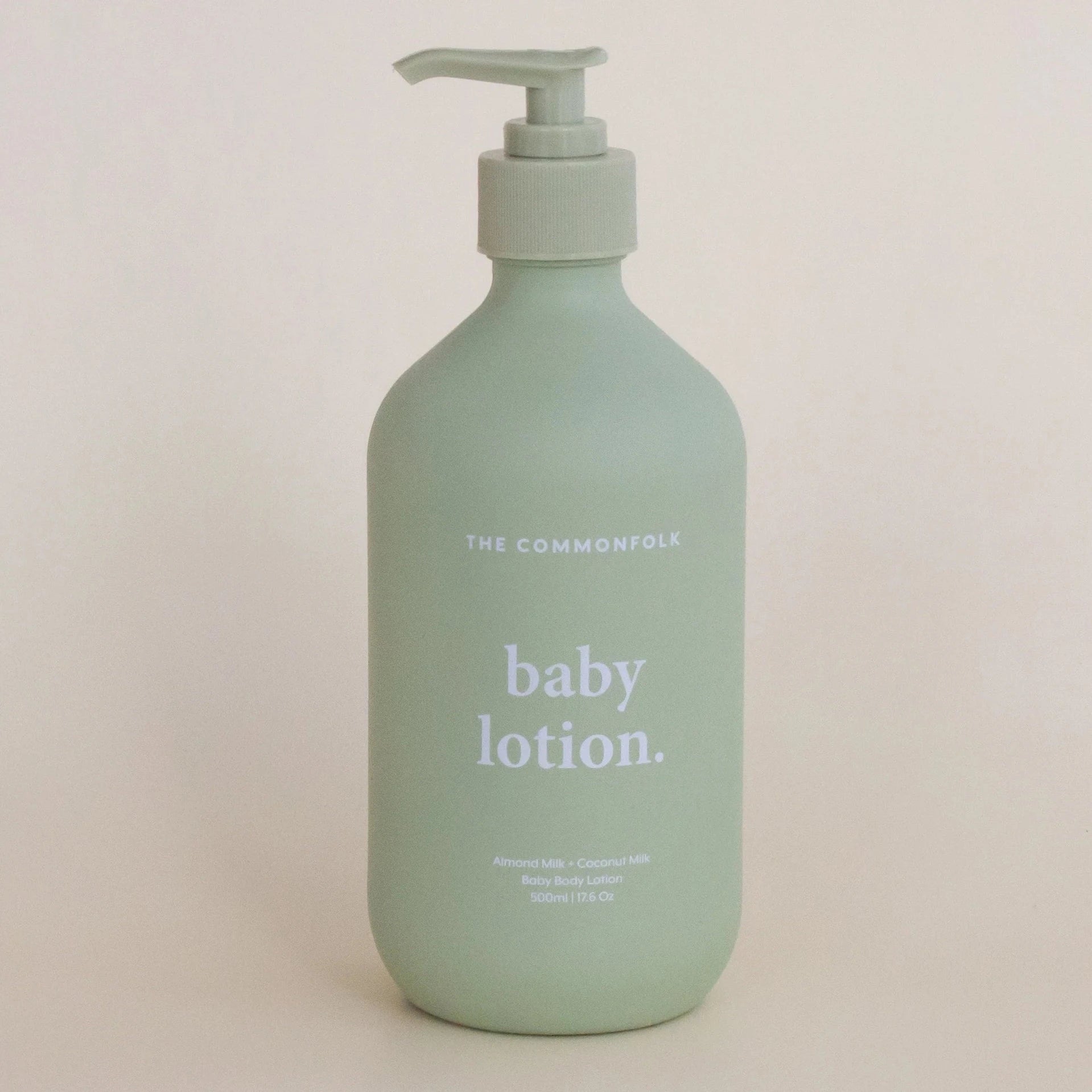 Sage green baby lotion bottle