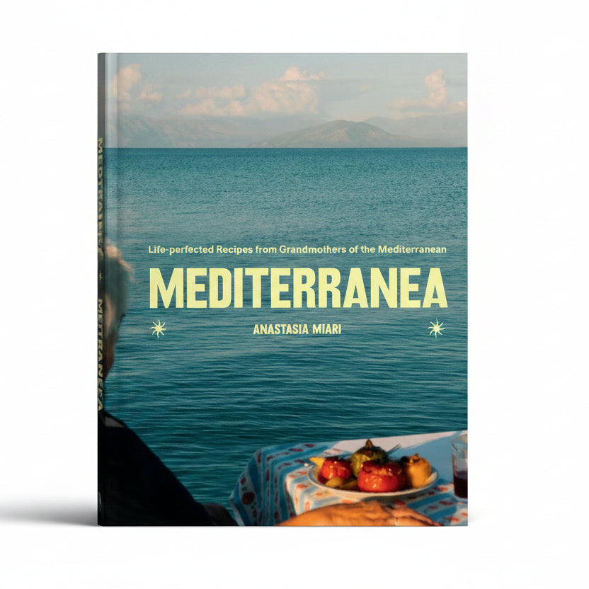 Book cover of 'Mediterranea' with a scenic view on a yellow background