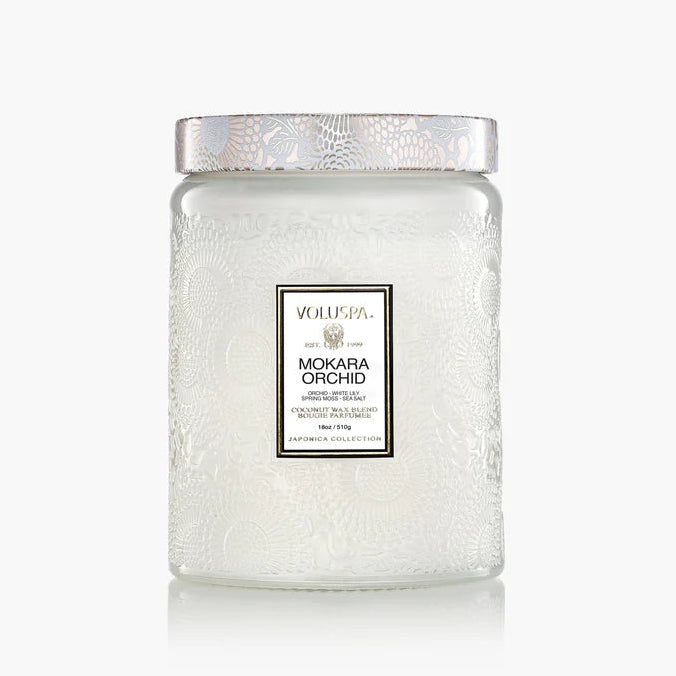 Jar of Voluspa Mokara Orchid candle on a white background