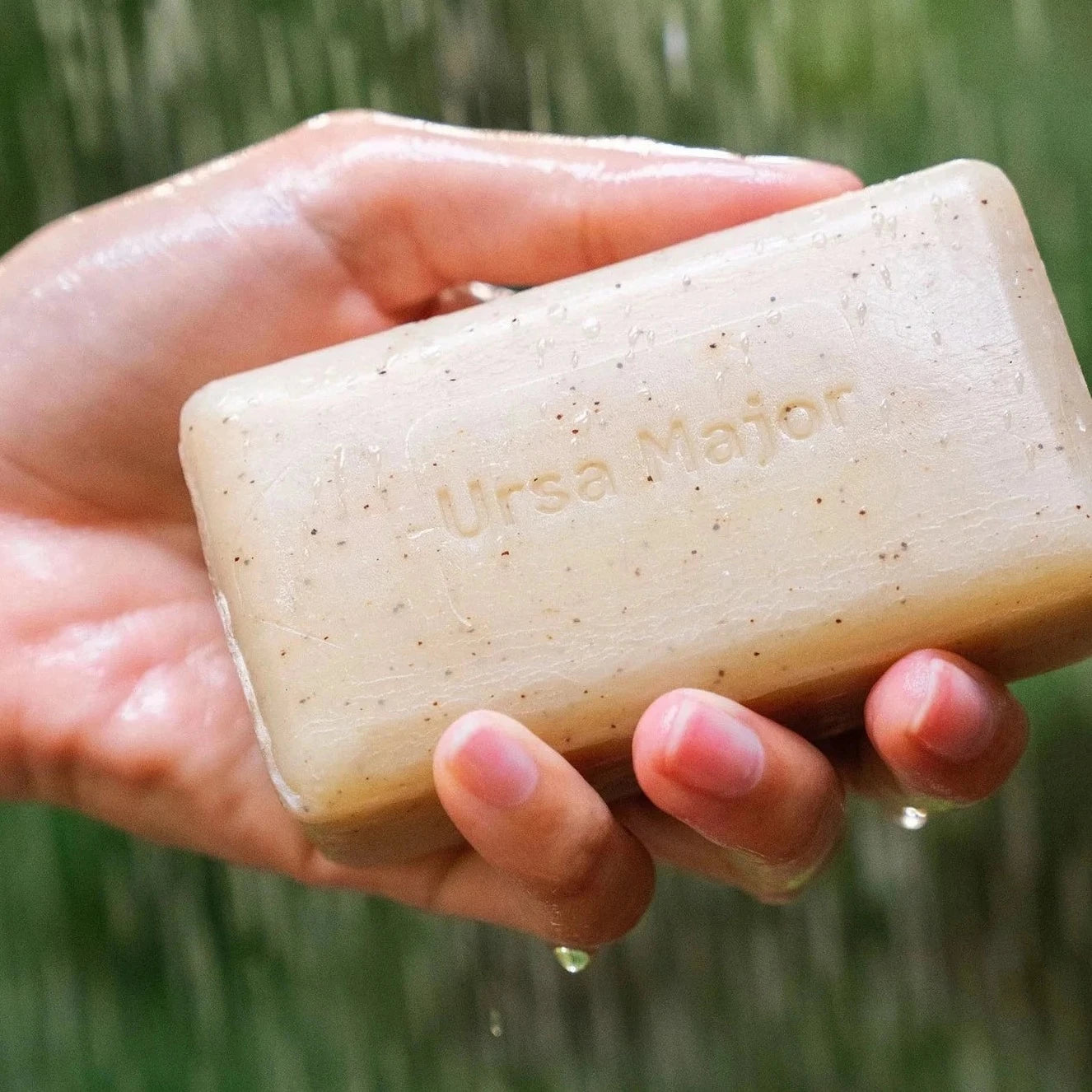 hand holding Ursa Major Morning Mojo Bar Soap