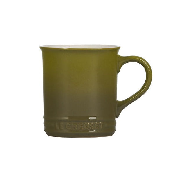 Green mug with a visible brand logo on a white background
