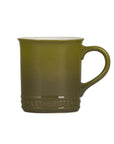 Green mug with a visible brand logo on a white background