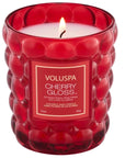red bubbly embossed candle 