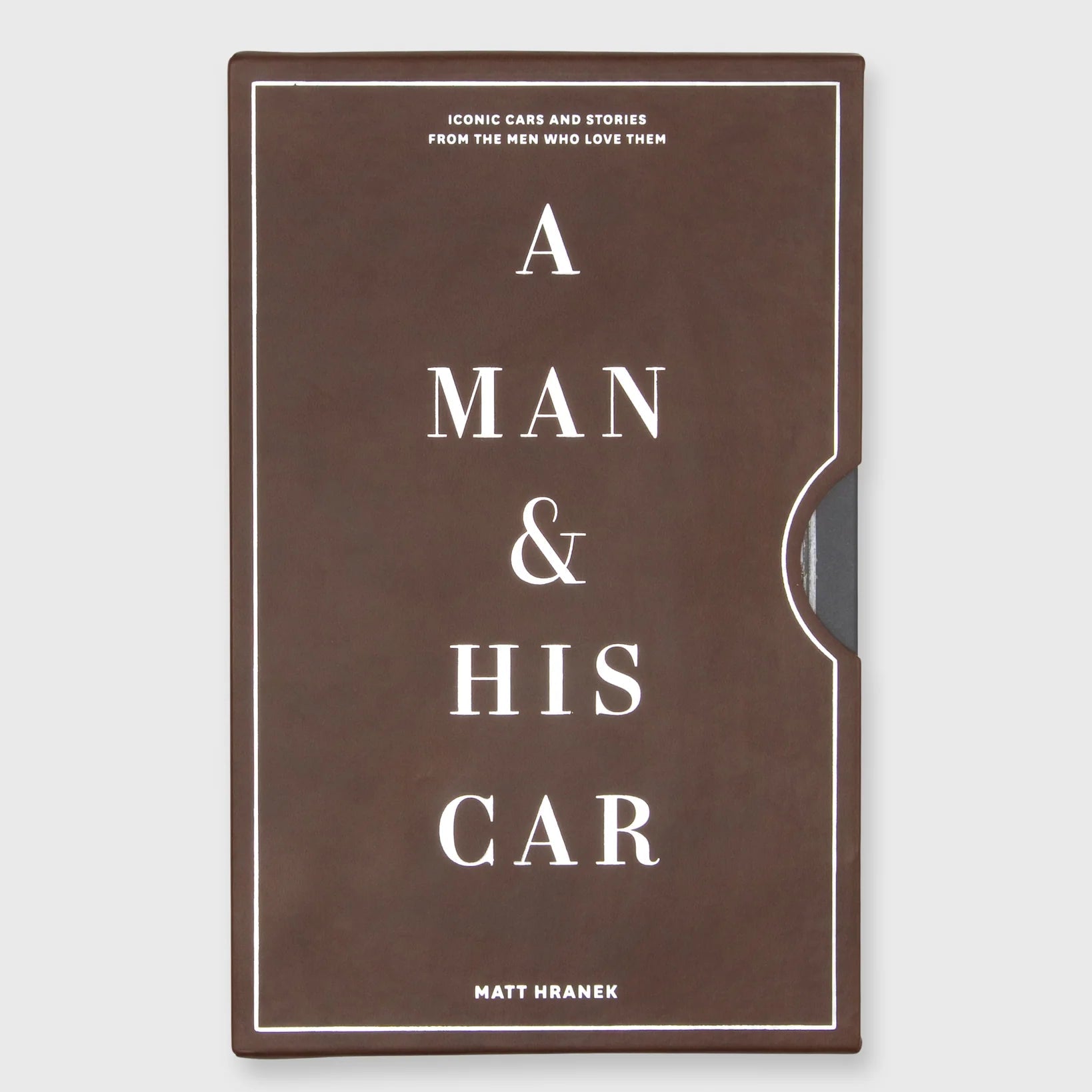 Book cover of 'A Man &amp; His Car' by Matt Hranek on a light gray background