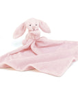 pale pink bunny holding blanket