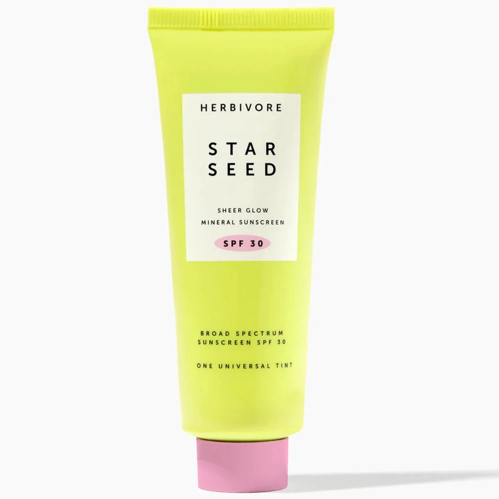 Neon Yellow Star Seed Suncreen tube with pink cap