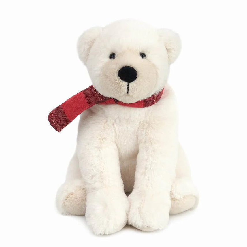 White teddy bear with a red scarf on a white background