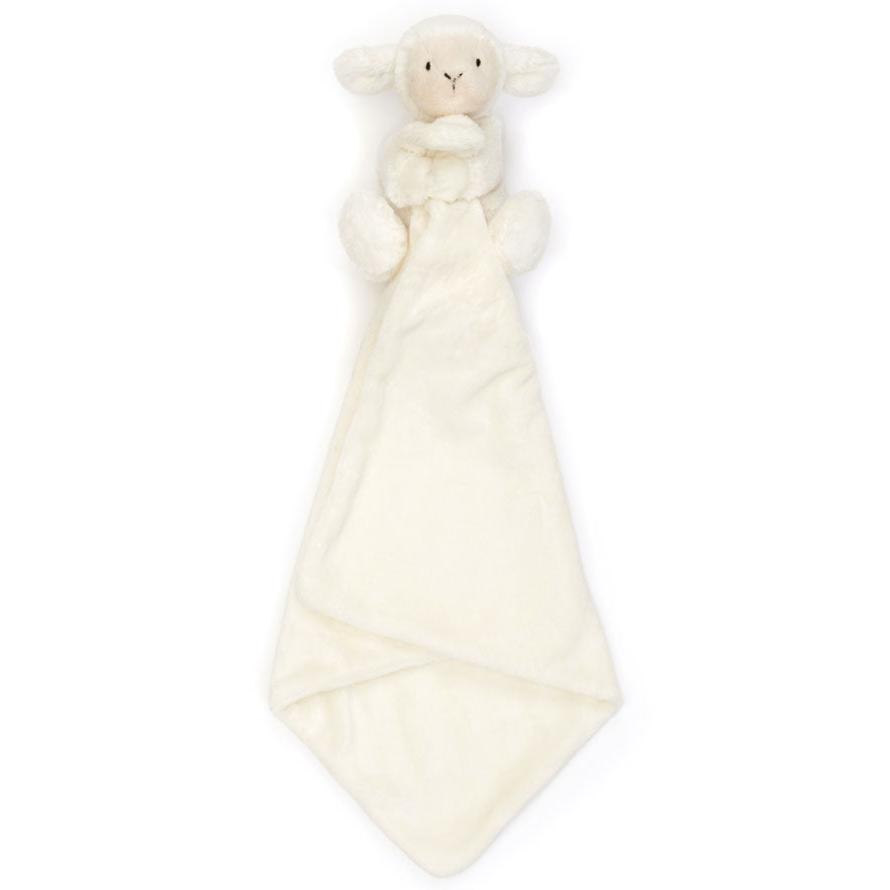 cream lamb holding blanket