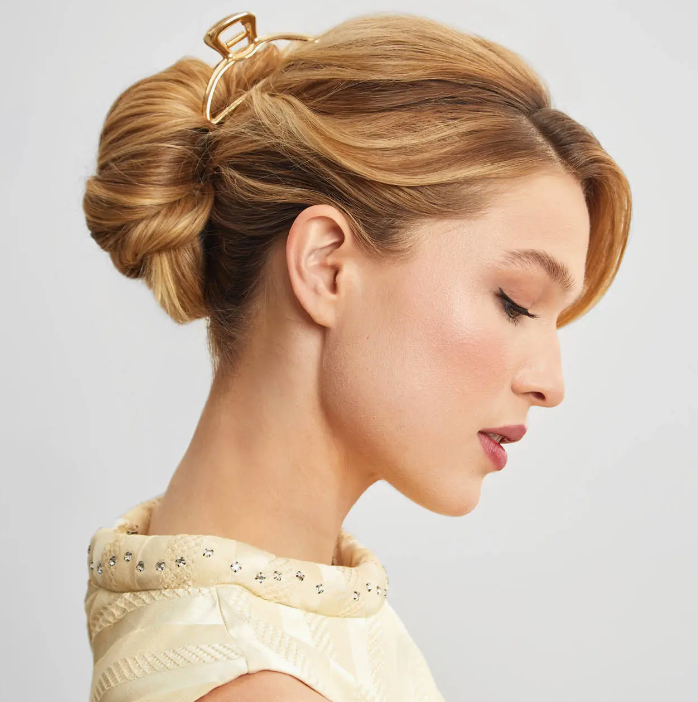 KITSCH Gold clip shown modeled in a woman's hair