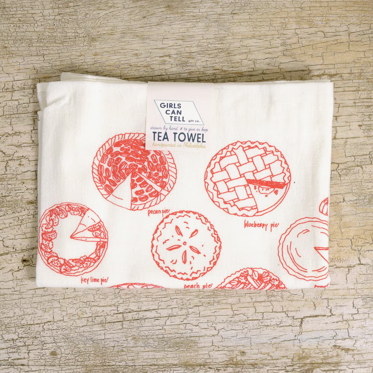 Tea towel with red pies