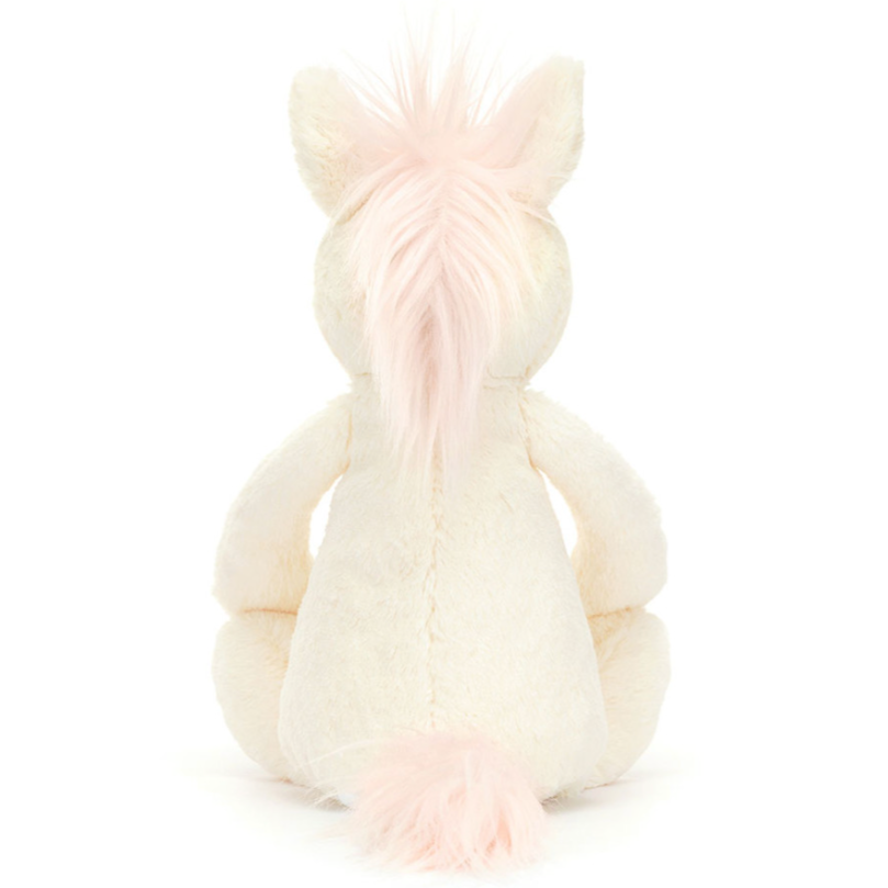 The unicorn is back facing on a white background